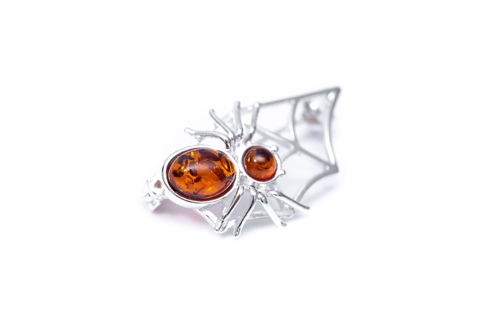 Amber hot sale spider brooch