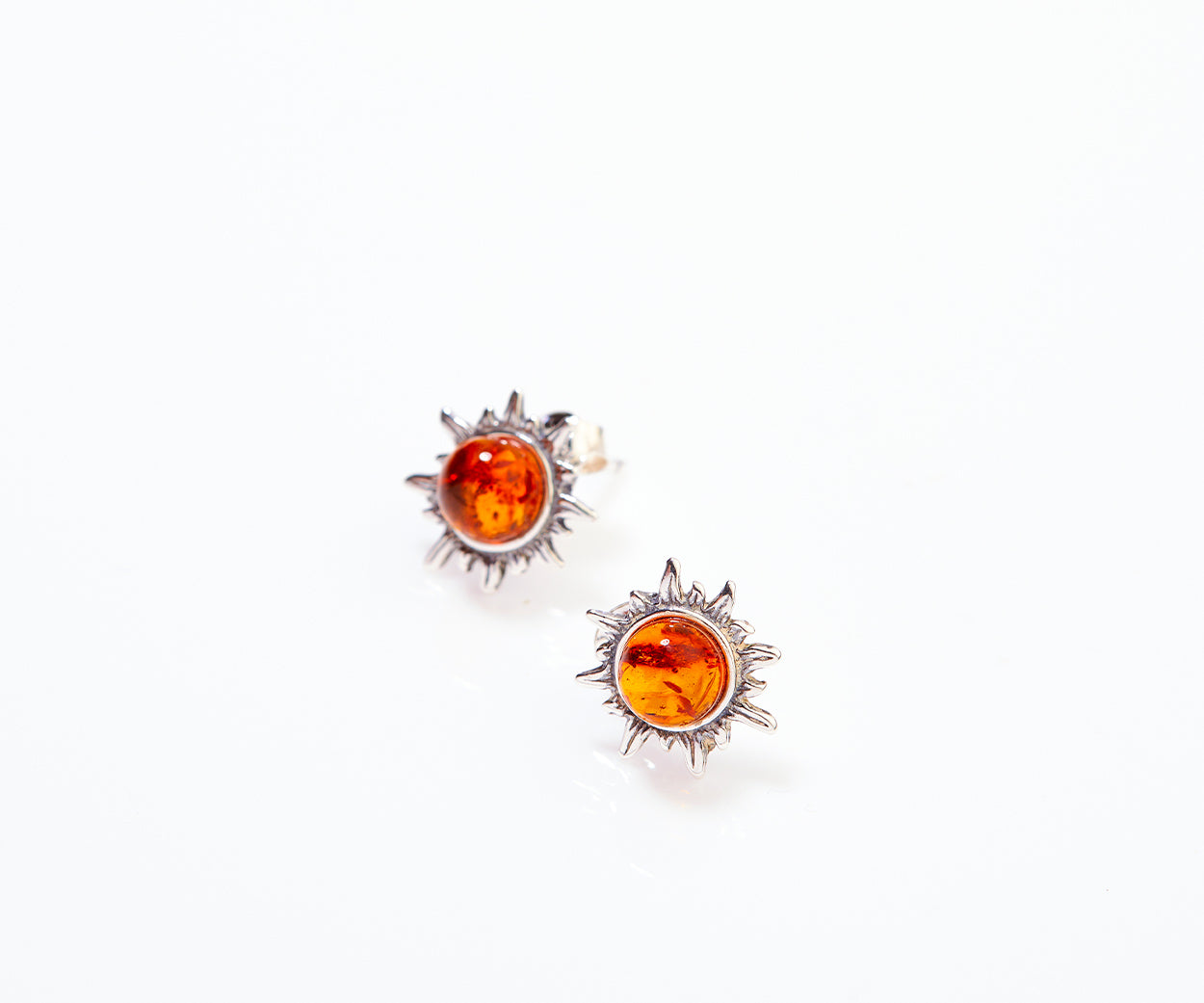 Amber Sun earrings – handcrafted in Baltic amber and sterling silver