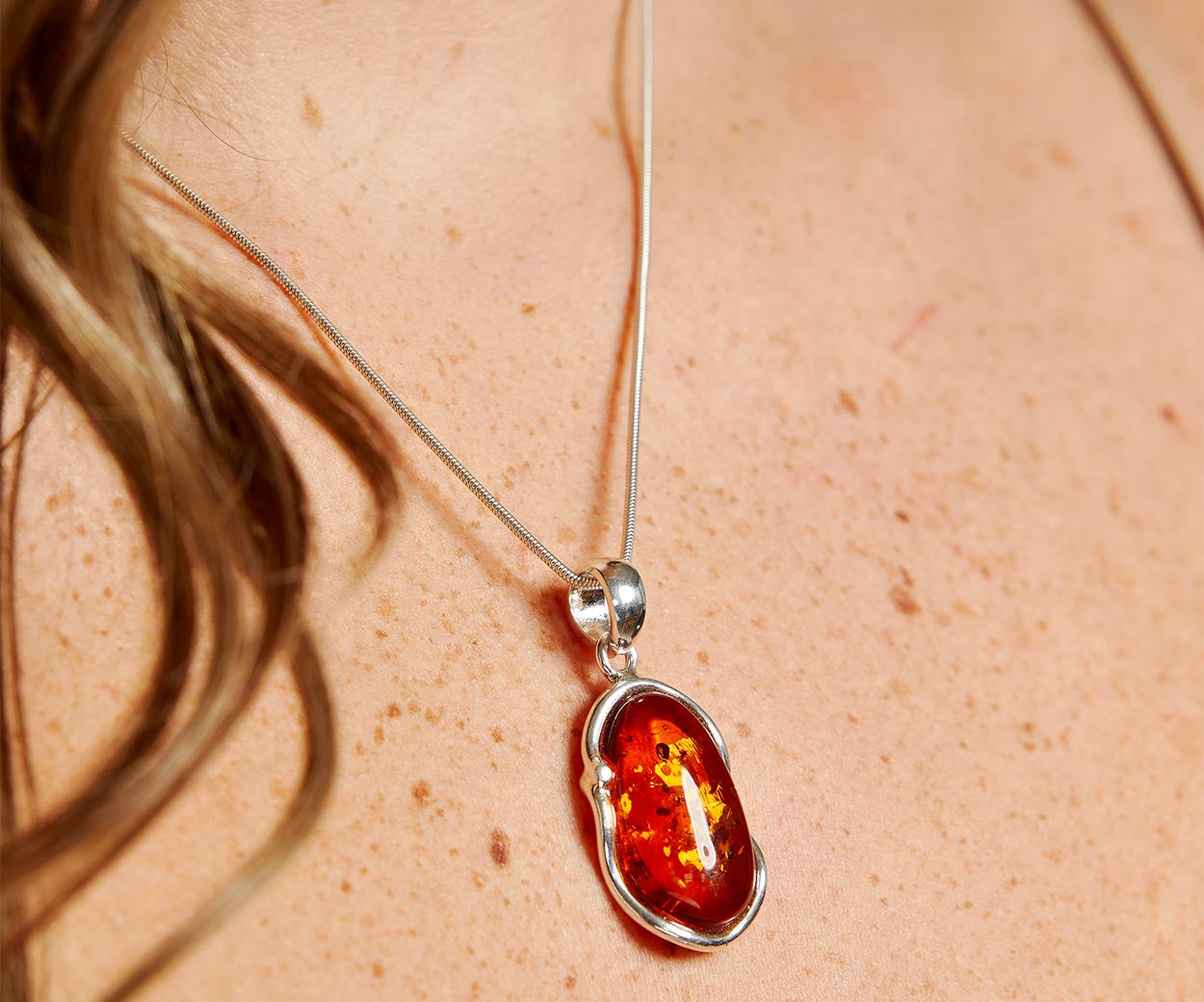 Amber Ripple Pendant Necklace – handcrafted in Baltic amber and sterling silver, view 2