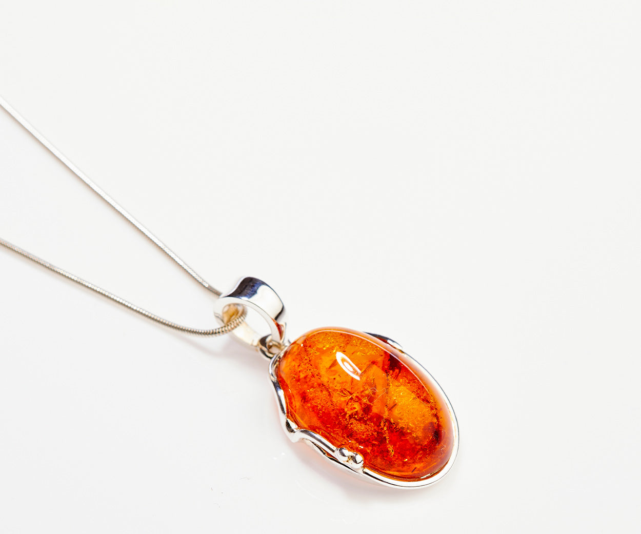 Amber Tidal Pendant Necklace – handcrafted in Baltic amber and sterling silver
