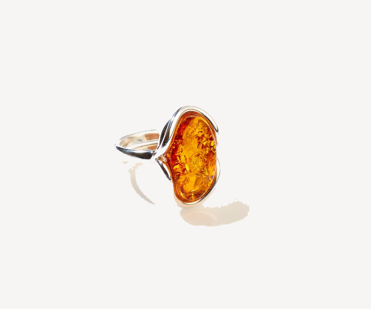Amber Ripple Ring – handcrafted in Baltic amber and sterling silver