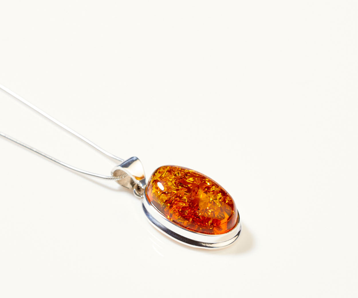 Cognac Amber Sol Pendant – necklace in Baltic amber and sterling silver