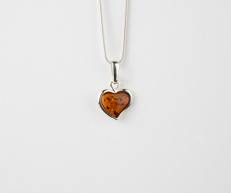 Subtle Heart Pendant Necklace – handcrafted in Baltic amber and sterling silver