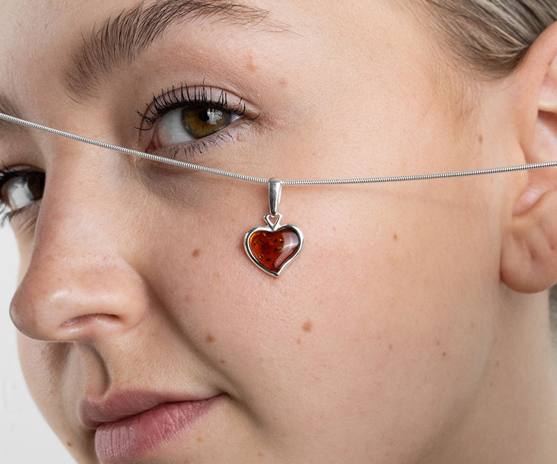 Subtle Heart Pendant Necklace – handcrafted in Baltic amber and sterling silver, view 2