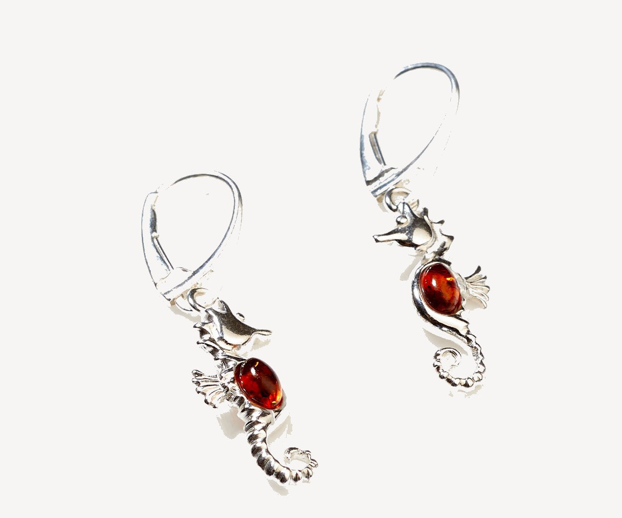 Amber Seahorse Drop Earrings – handcrafted in Baltic amber and sterling silver