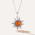 Amber Sun Charm Pendant — Baltic amber and sterling silver jewellery by Baltic Beauty