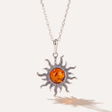 Amber Sun Charm Pendant — Baltic amber and sterling silver jewellery by Baltic Beauty
