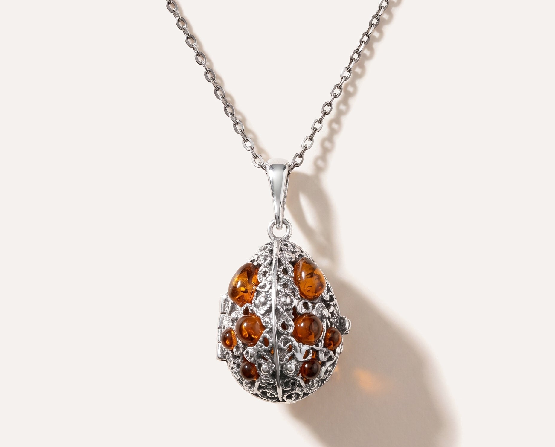 Fabergé Inspired Amber Egg Locket Necklace — Baltic amber and sterling silver jewellery by Baltic Beauty