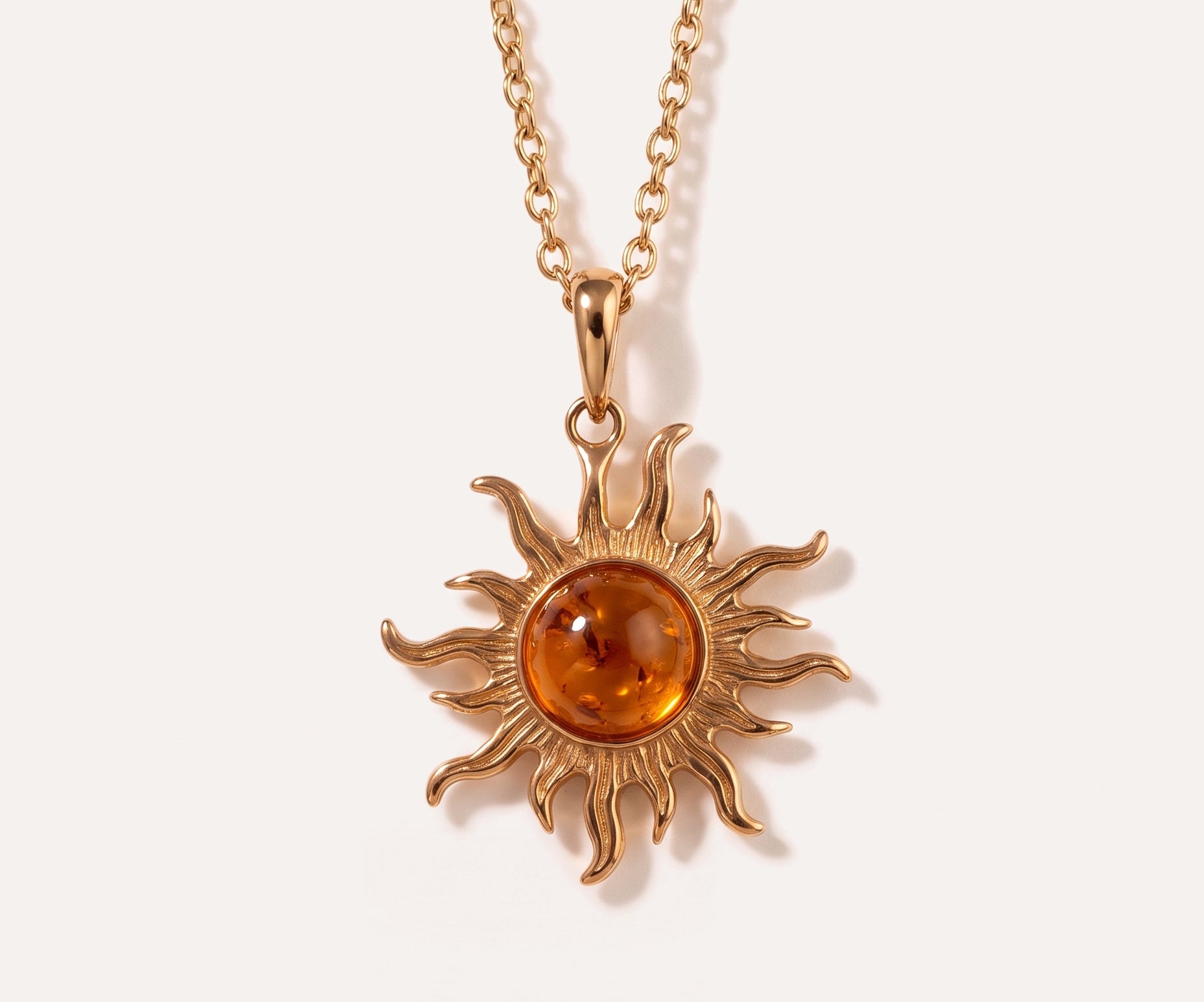 Gold Amber Sun Charm Pendant — Baltic amber and sterling silver jewellery by Baltic Beauty