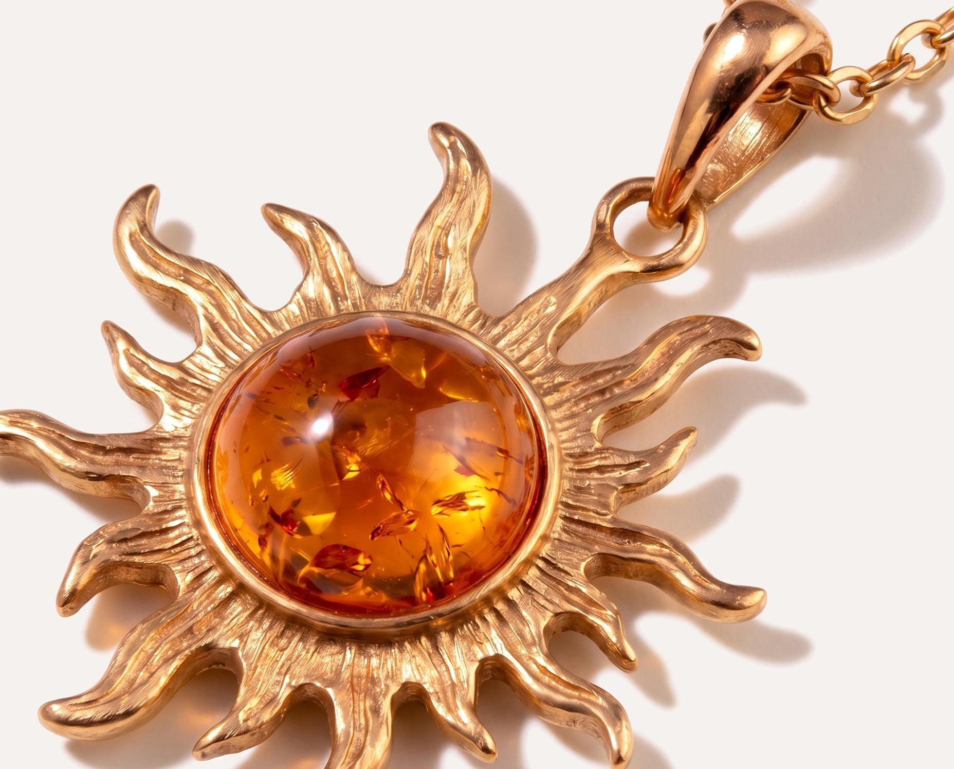 Gold Amber Sun Charm Pendant — Baltic amber and sterling silver jewellery by Baltic Beauty