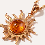 Gold Amber Sun Charm Pendant — Baltic amber and sterling silver jewellery by Baltic Beauty
