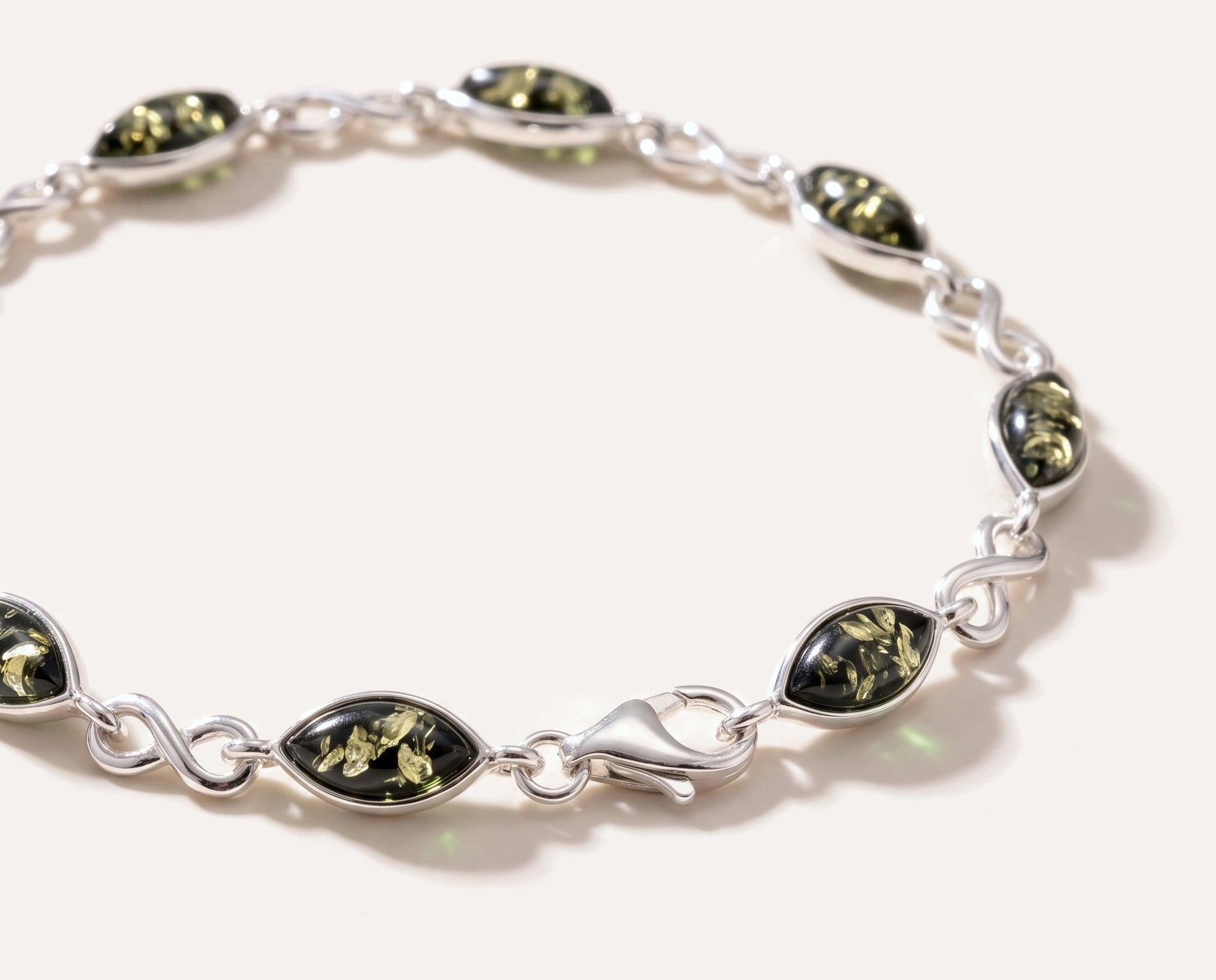 Green Amber Infinity Bracelet — Baltic amber and sterling silver jewellery by Baltic Beauty