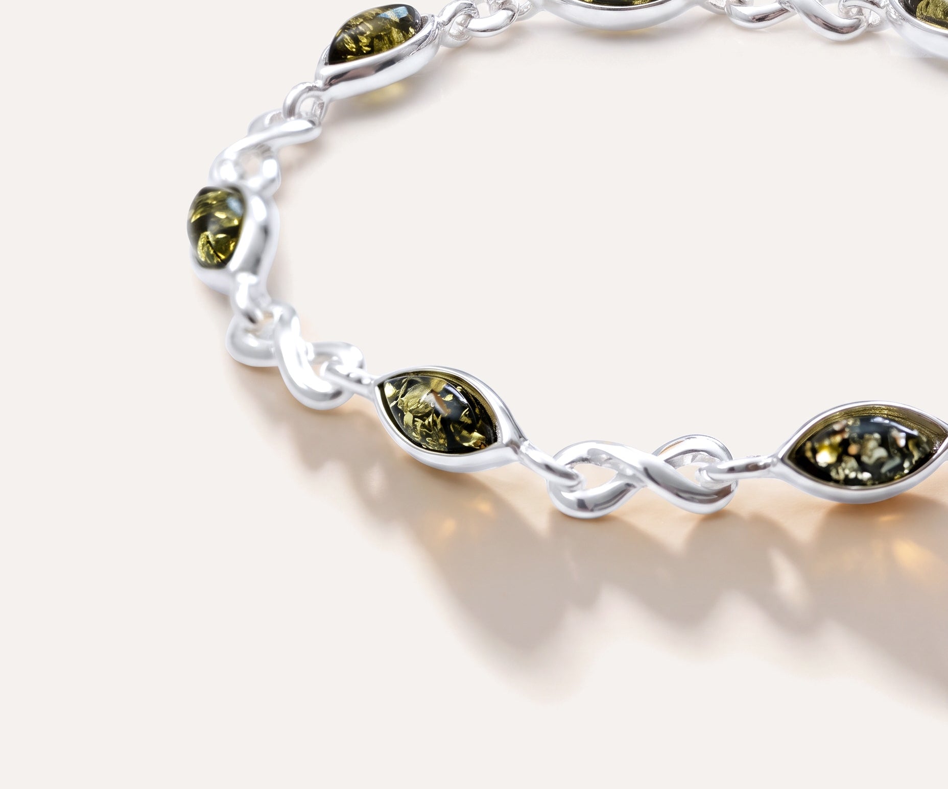 Green Amber Infinity Bracelet — Baltic amber and sterling silver jewellery by Baltic Beauty