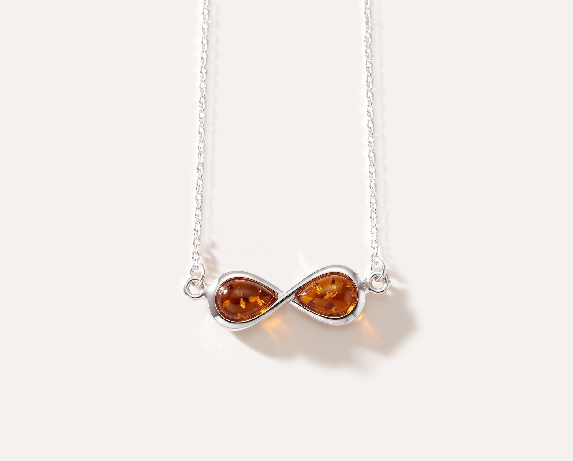 Infinity Charm Necklace — Baltic amber and sterling silver jewellery by Baltic Beauty