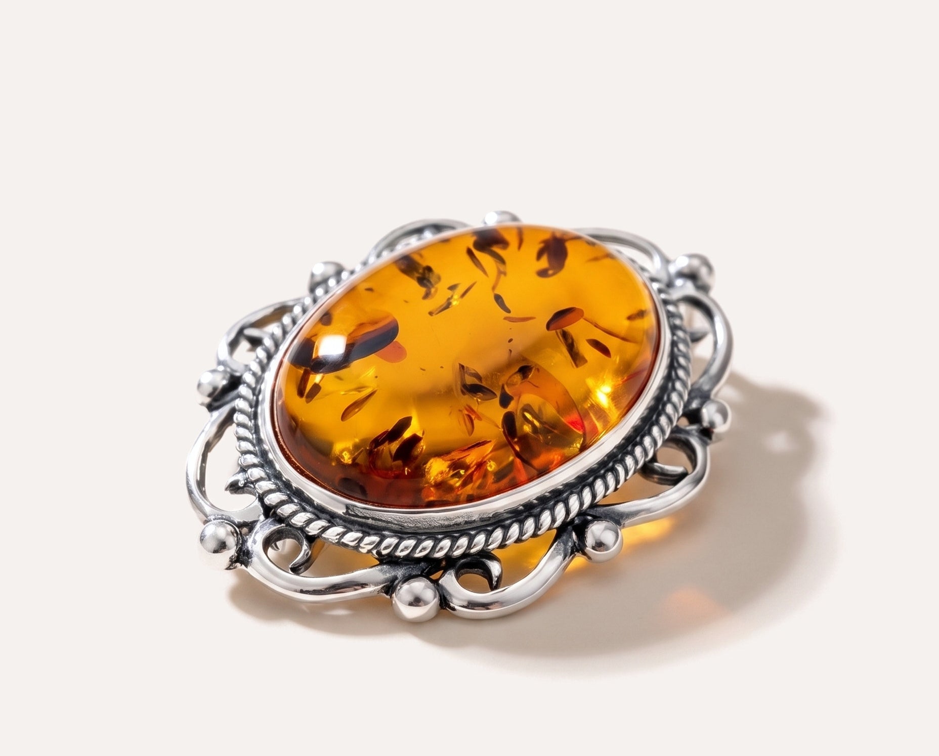 Oval Classic Framed Amber Brooch — Baltic amber and sterling silver jewellery by Baltic Beauty