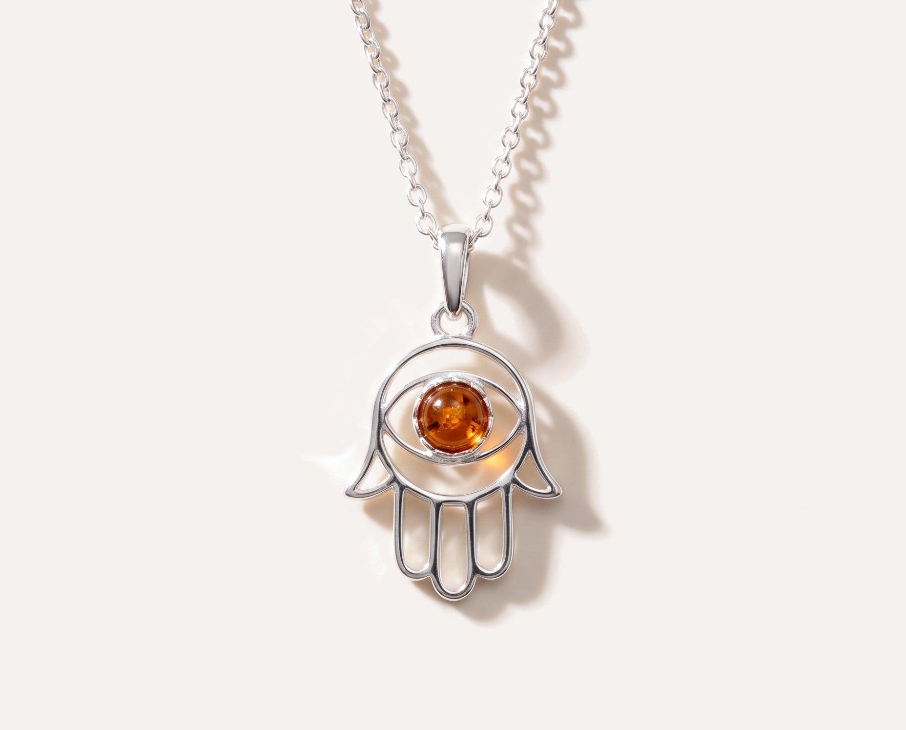 Small Amber Hamsa Pendant — Baltic amber and sterling silver jewellery by Baltic Beauty