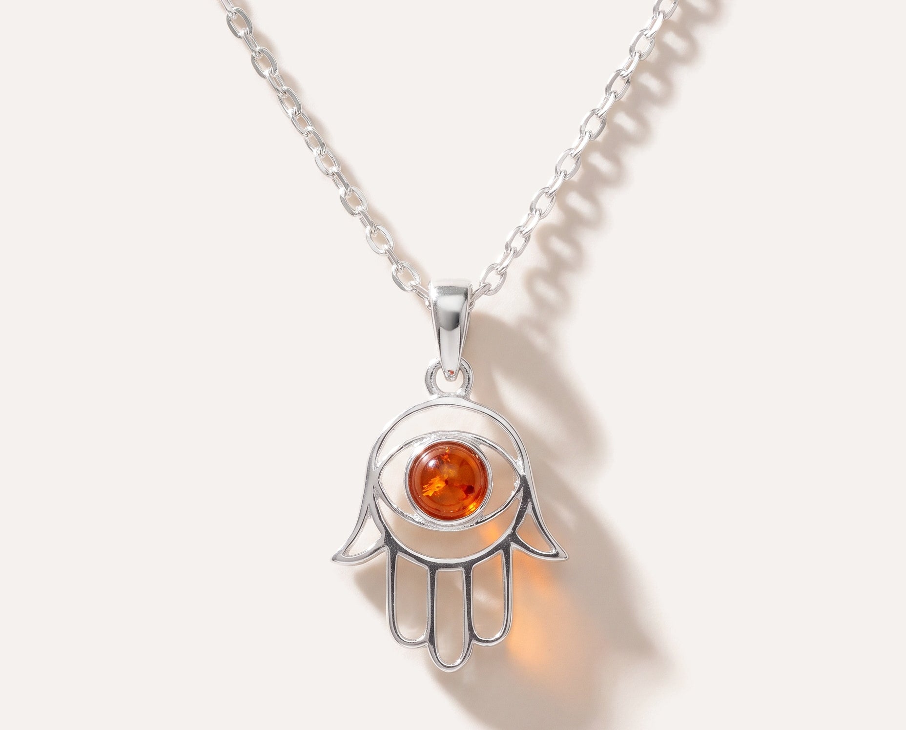 Small Amber Hamsa Pendant — Baltic amber and sterling silver jewellery by Baltic Beauty