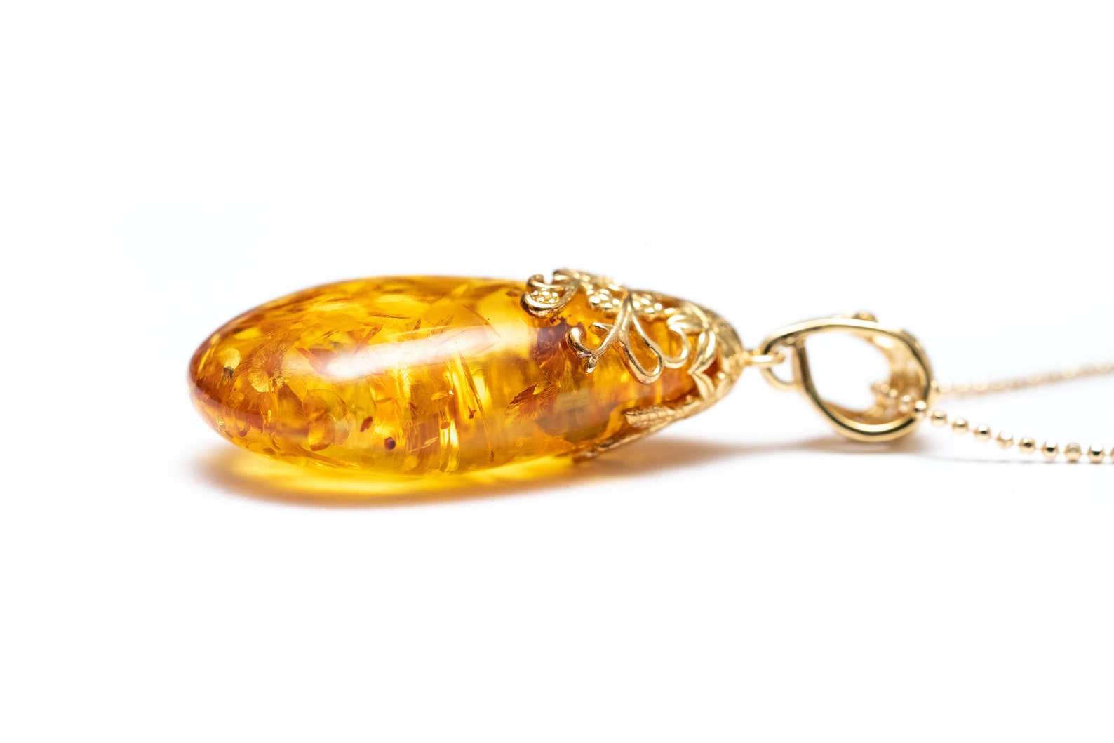 Gold Floral Accent Amber Droplet Pendant- Necklaces- Baltic Beauty