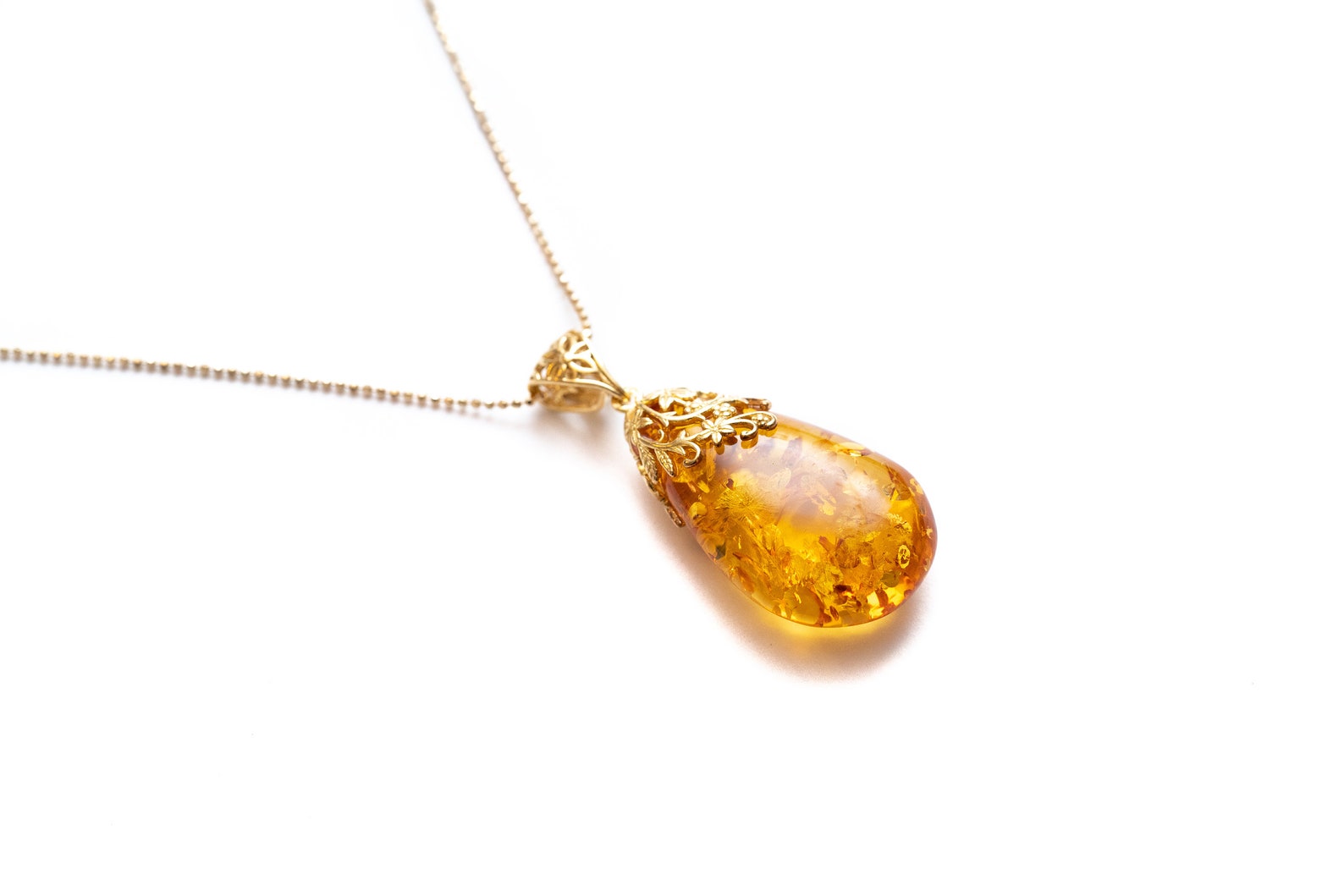 Gold Floral Accent Amber Droplet Pendant- Necklaces- Baltic Beauty