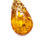Gold Floral Accent Amber Droplet Pendant- Necklaces- Baltic Beauty