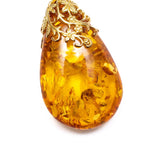 Gold Floral Accent Amber Droplet Pendant- Necklaces- Baltic Beauty