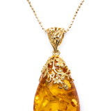 Gold Floral Accent Amber Droplet Pendant- Necklaces- Baltic Beauty