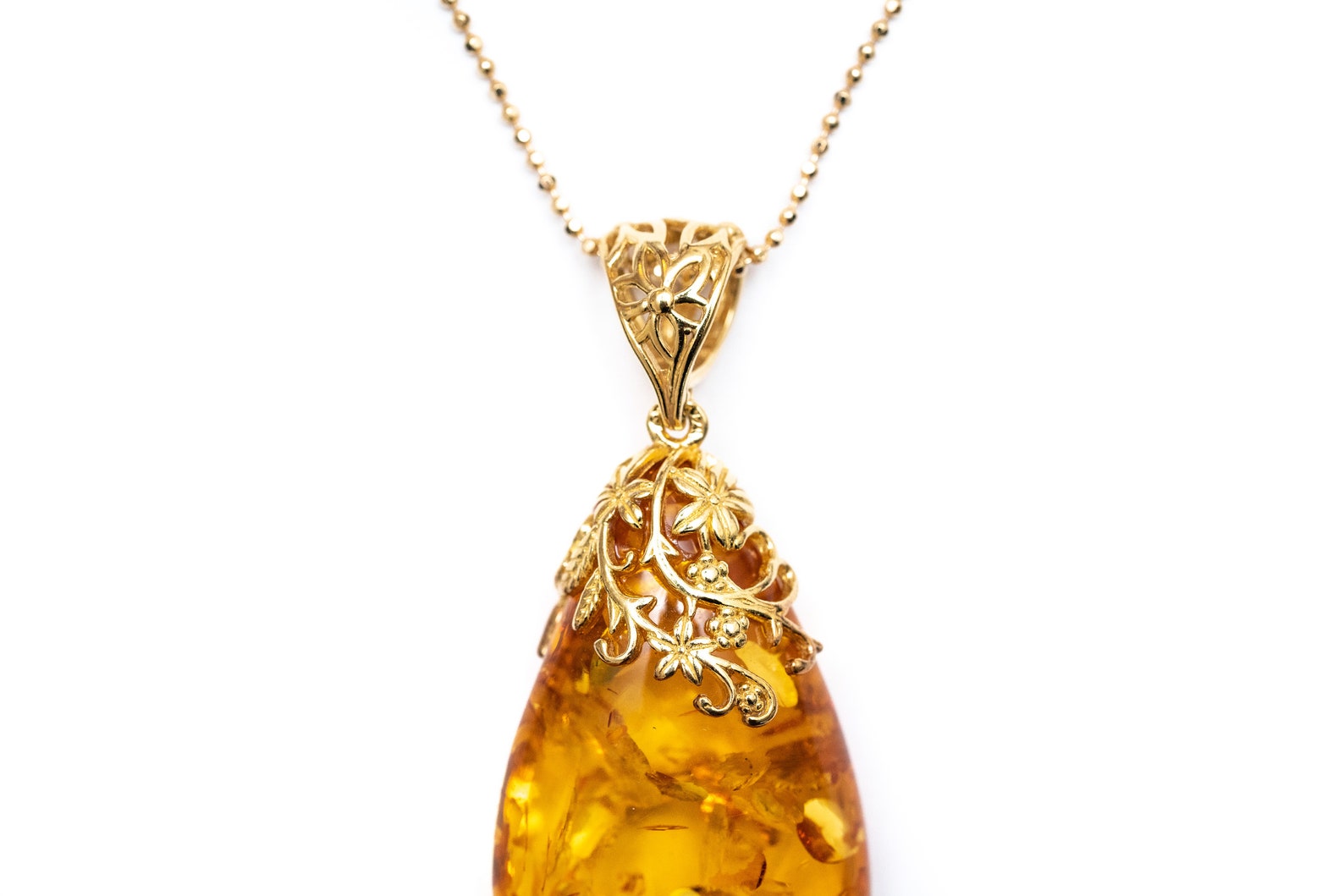 Gold Floral Accent Amber Droplet Pendant- Necklaces- Baltic Beauty